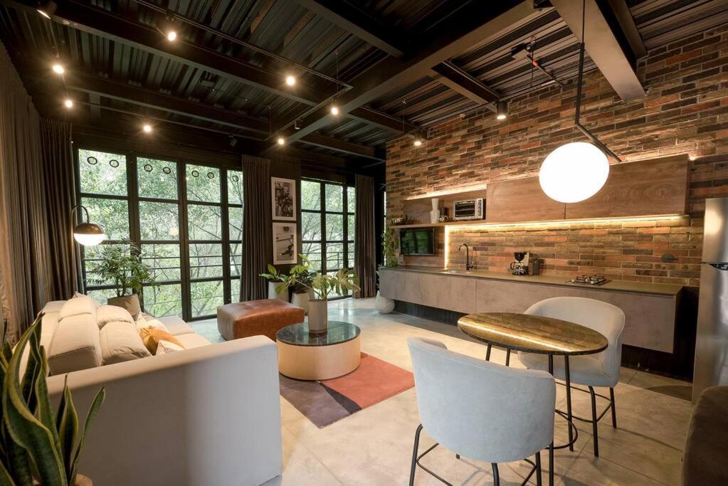 Hotel Meridiano Lofts Medellin Bagian luar foto
